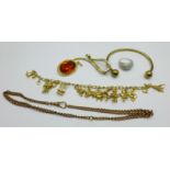 A collection of gold tone costume jewellery