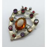 A white metal stone set Scottish Cairngorm Luckenbooth brooch (tests as silver), 65mm