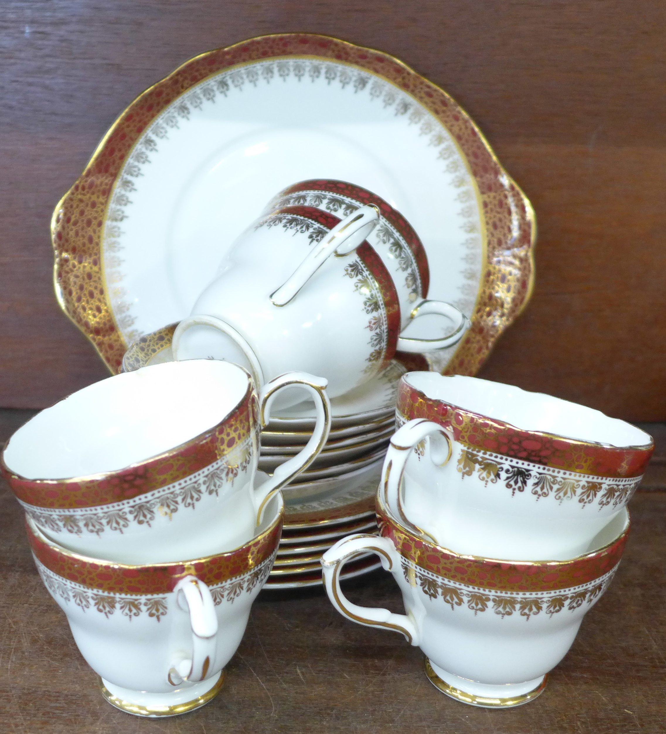 A six setting Duchess Winchester tea service with sandwich plate, gilding worn