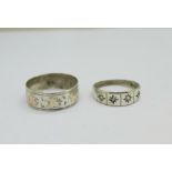 A Victorian gold applied silver ring, Birmingham 1888, T, and a Victorian silver, white stone set