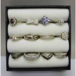 Twelve silver dress rings, most set with stones