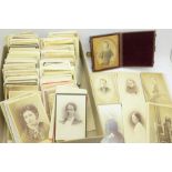 A box of over 200 Victorian carte de visite and a photograph in case