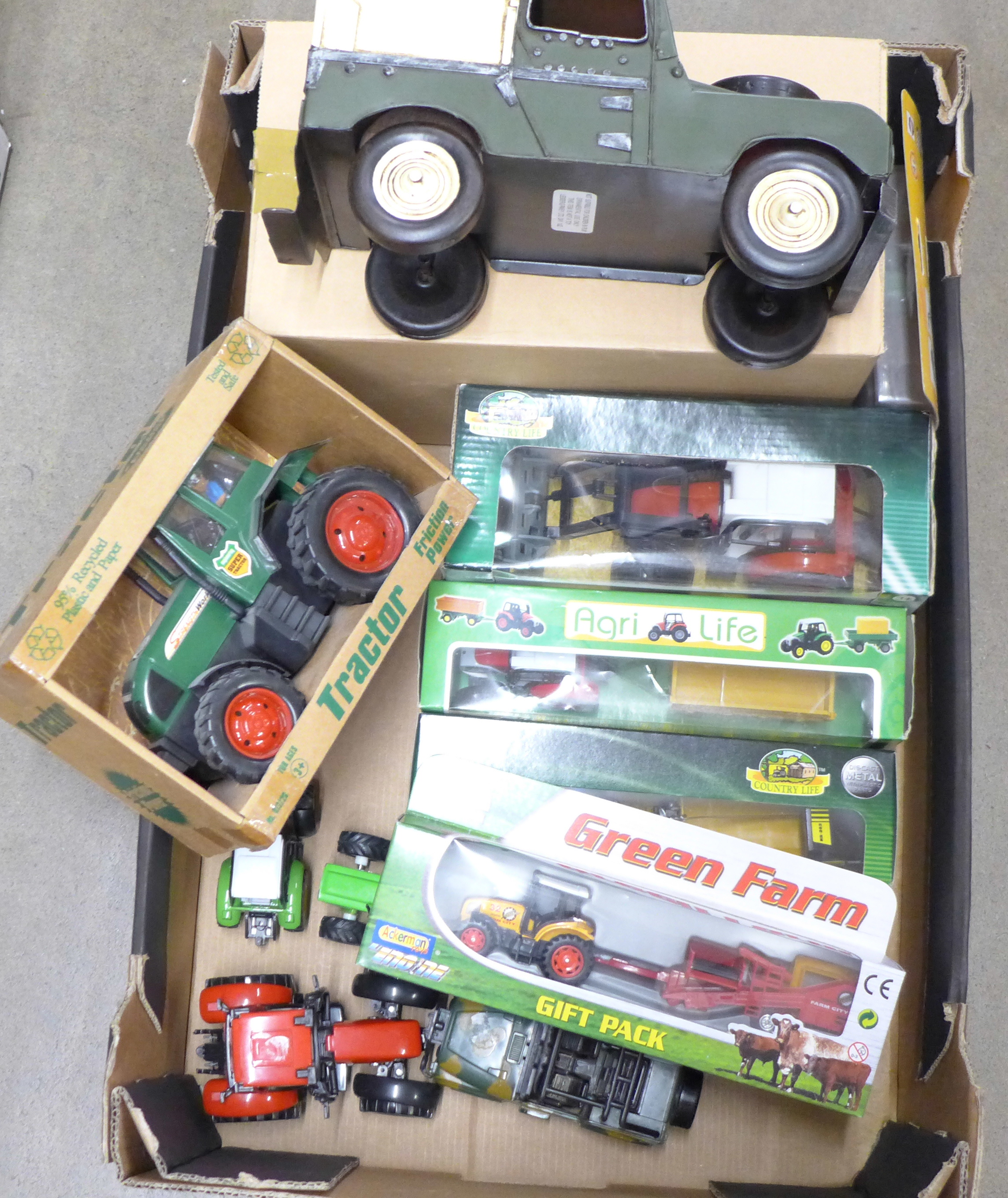 A tin-plate model Land Rover and other farming die-cast model vehicles **PLEASE NOTE THIS LOT IS NOT