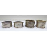 Two pairs of silver napkin rings, engraved, 51g