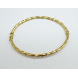 A 9ct gold bangle, 3.2g