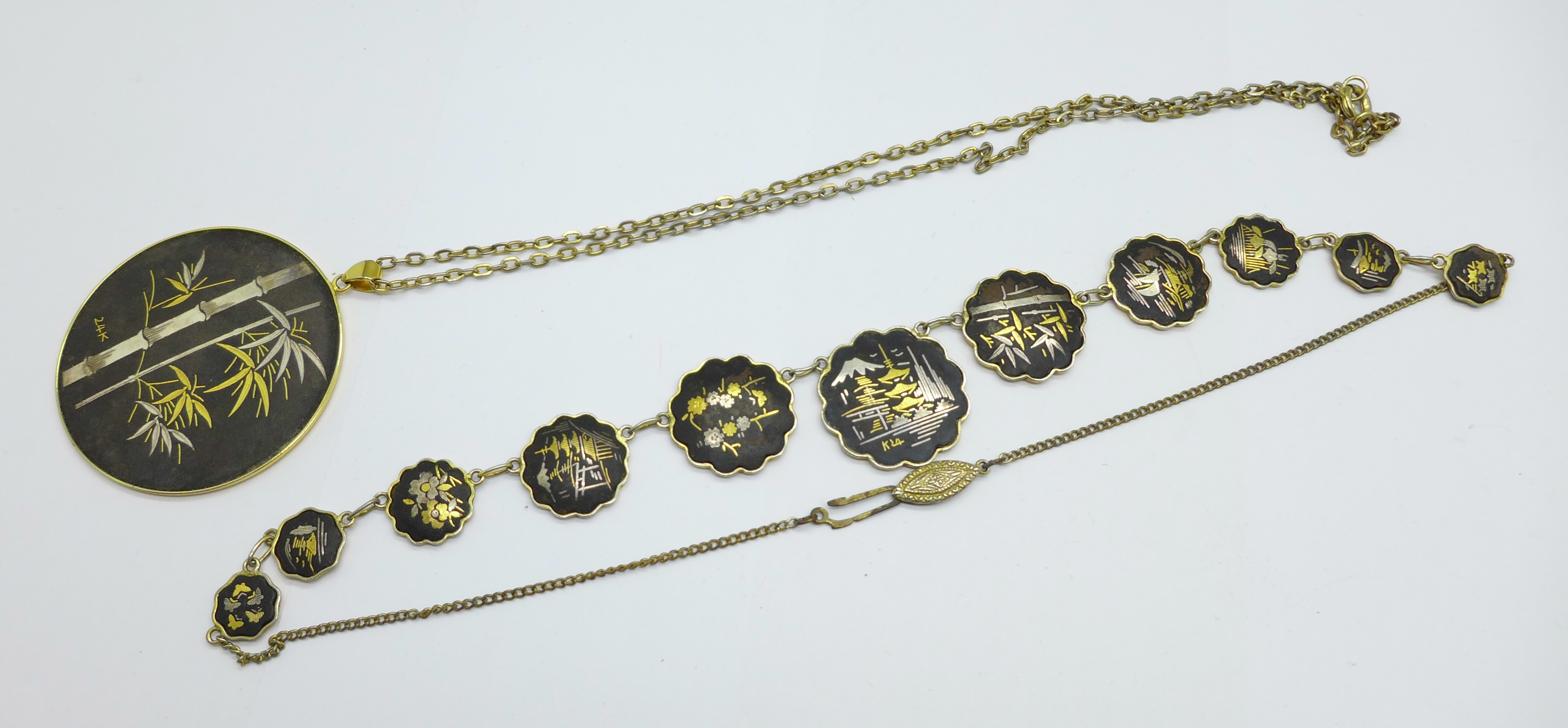 A Japanese Damascene necklace and pendant inlaid with 24k gold and 14k gold