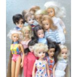 Ten early Sindy dolls, one Action Girl and one Barbie, (12)