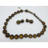 A 1950's Christian Dior necklet by Mitchel Maer, one stone missing and a matching pair of earrings