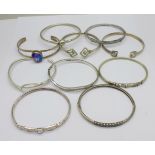 Ten silver bangles, 116g