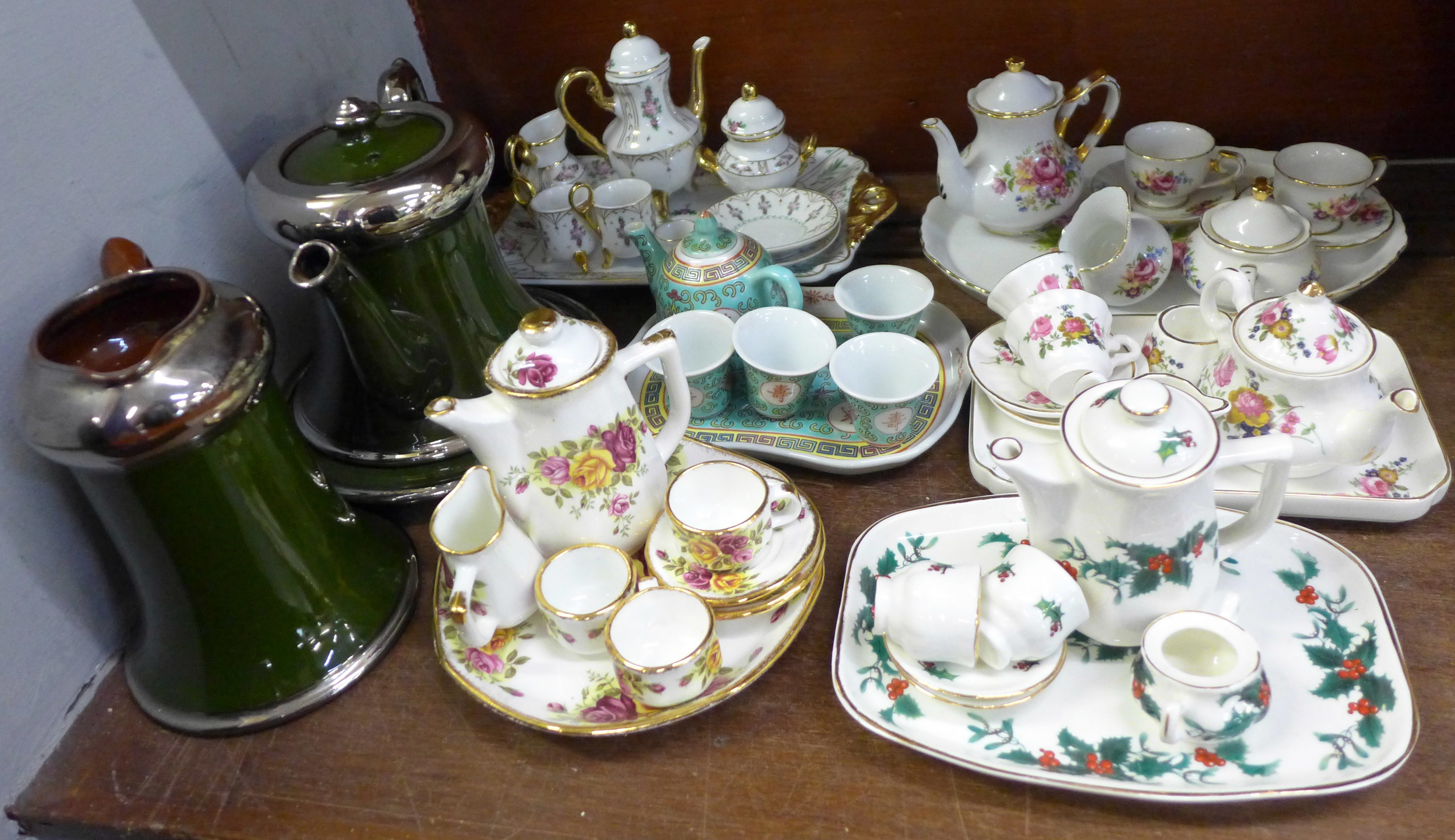 A collection of six miniature teasets including Regal, Paul Ann, Staffordshire Collectables, the