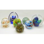 A collection of glass paperweights (7)