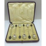 A cased set of six Asprey silver coffee bean spoons, Sheffield 1911, 45g