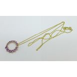 A 9ct gold and amethyst pendant and chain, 1.9g