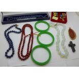 Lapis brooches, a lapis-lazuli necklace, glass bangles, bead jewellery, etc.