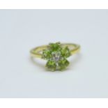 A silver gilt, peridot and diamond cluster ring, (GEMS TV), P