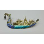 A silver gilt and enamel boat brooch, stamped Siam Sterling, 53mm