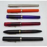 Six vintage Sheaffer pens, two with translucent cases