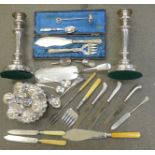 A collection of silver plate, candlesticks, an egg stand, etc.