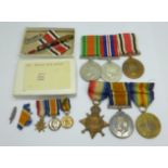 A family group of medals, three WWII medals including Special Constable, a trio of WWI medals to