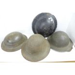 Four British WWII helmets including one civilian and an Army Officer's Regulation tunic