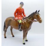 A Beswick huntsman on horseback