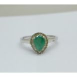 A silver, emerald and diamond set ring, T/U