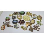 A collection of costume brooches