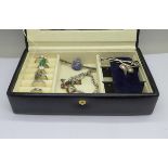 A jewellery box and silver jewellery