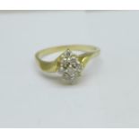 A yellow metal (tests as 9ct gold) and diamond ring, 2.3g, R
