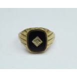 A gentleman's 9ct gold, onyx and diamond signet ring, 3.7g, Y