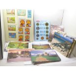 A collection of postcards and a stamp album