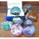 Eight glass paperweights including Caithness