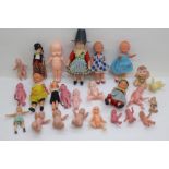 A basket of approximately forty miniature and doll's house dolls