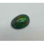 An unmounted black opal, 1.59cts