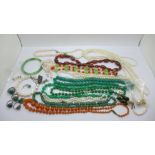 An agate bead necklace, other bead necklaces, pearls and two rings