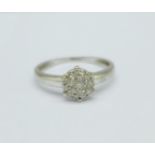 A 9ct white gold and diamond cluster ring, 1.7g, Q