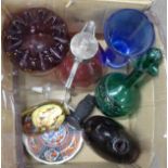 A collection of glassware including coloured, an oriental plate, one figure and a vase **PLEASE NOTE