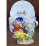 A Royal Worcester figure, Noddy, a Royal Doulton Winnie the Pooh figure, a Beswick Beatrix Potter