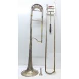 A cased Besson g-flat trombone