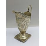 A Georgian silver helmet shaped jug, London 1793, 101g (weighted base)