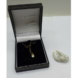 A pair of 9ct gold earrings and a diamond pendant and chain, diamond weight approximately 0.5carat
