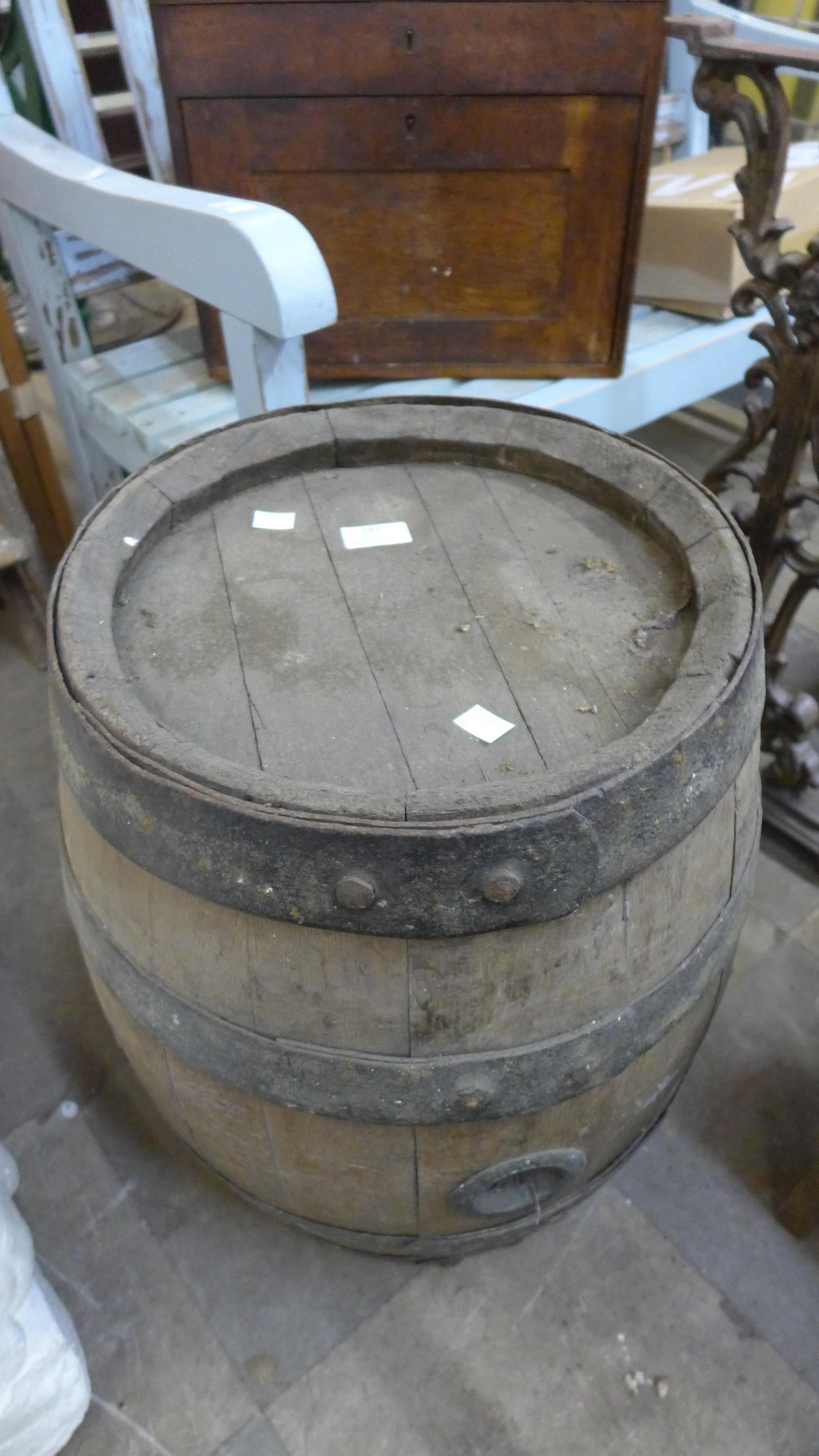 A Victorian coopered oak barrel