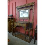 A large Victorian Aesthetic Movement carved oak hallstand