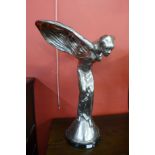 A large chrome Spirit of Ecstasy figure, on black marble socle