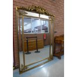 A large French style gilt framed mirror with crest, 191 x 135cms (M24238) #