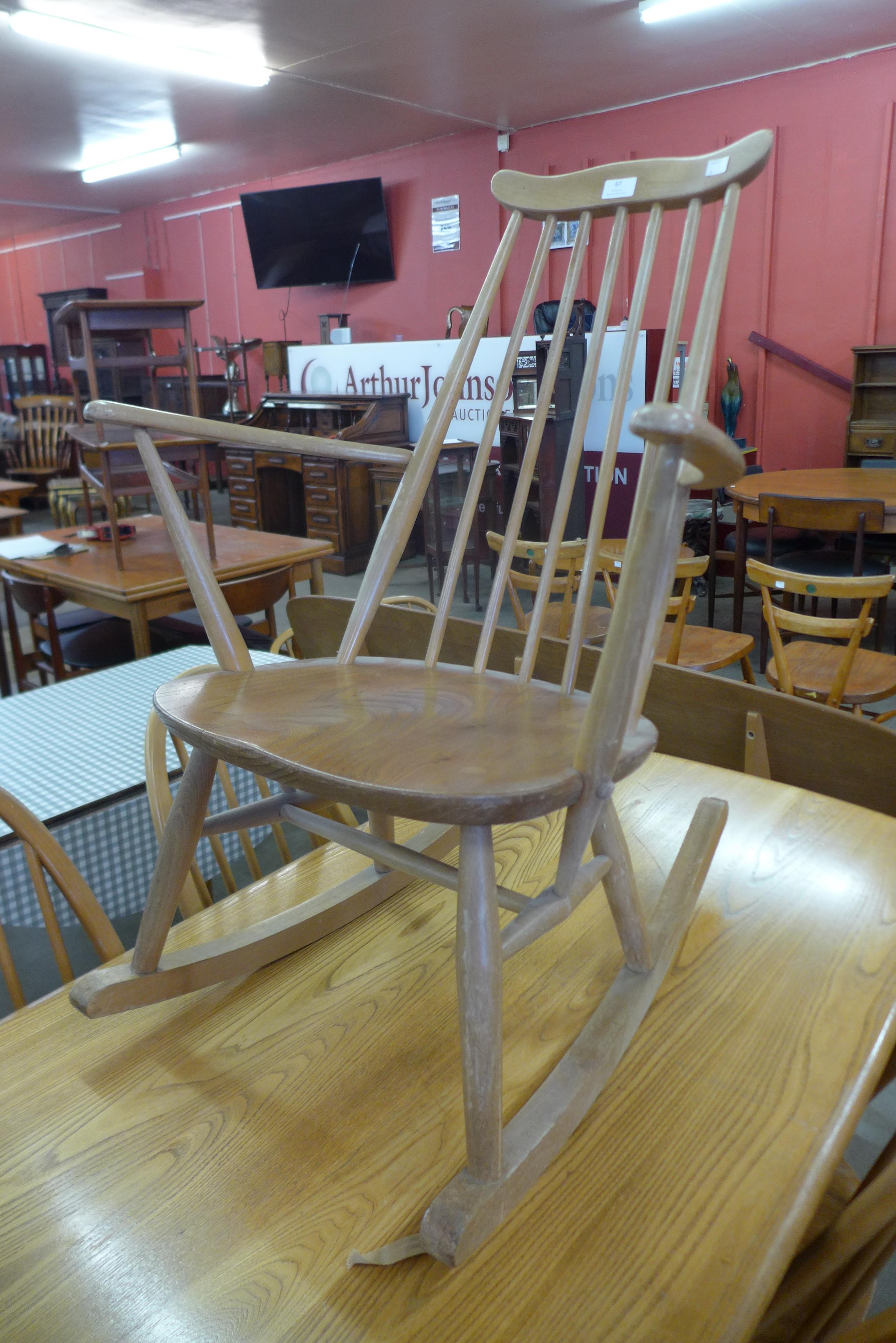 An Ercol Blonde elm and beech Goldsmith rocking chair