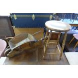 A child's wooden wheelbarrow and a beech stool