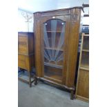 A carved oak bookcase