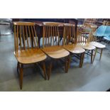 A set of five beech spindle back kitchen chairs
