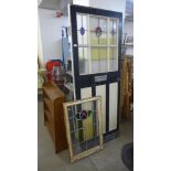 A stained glass door and a stained glass window